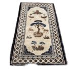 Chinese rug together with a narrow Persian rug