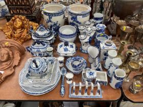 Group of various blue and white ceramics to include jugs, toast rack and dishes.