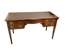 Edwardian mahogany writing table with five drawers and leather lined top