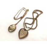 9ct gold heart shaped locked on 9ct gold chain and one other 9ct gold locket on a gold plated chain