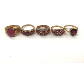 Five 9ct gold pink and red gem set dress ring