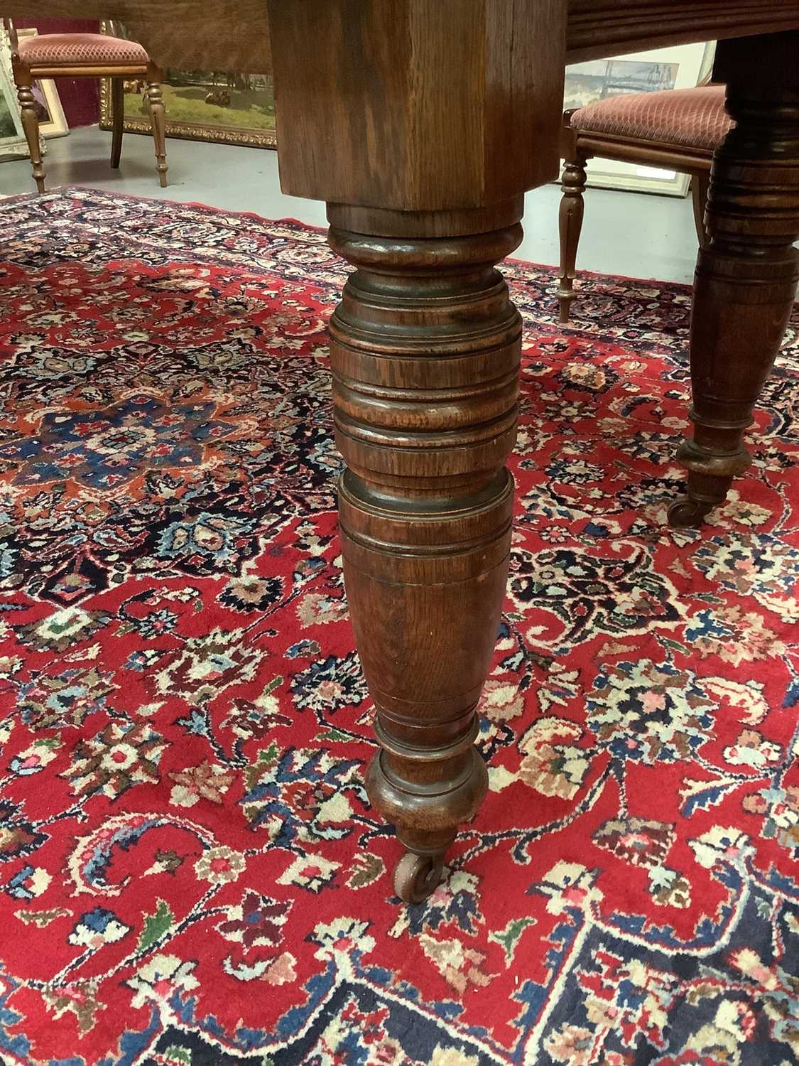 Large Edwardian oak extending dining table - Image 5 of 7