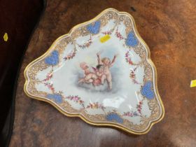 19th century Dresden porcelain trefoil dish, finely painted with cherubs on scale blue and gilt bord