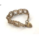 9ct gold gate bracelet with padlock clasp