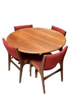 Mid century teak circular dining table and a set of four dining chairs