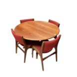 Mid century teak circular dining table and a set of four dining chairs