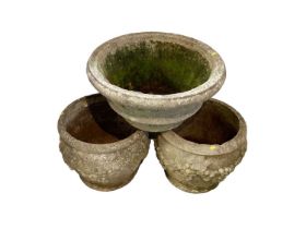 Three concrete garden planters, 40cm, 30cm and 40cm high