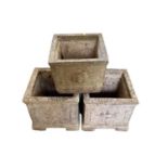 Pair of square concrete garden planters, 38cm high, together with another, 30cm high (3)