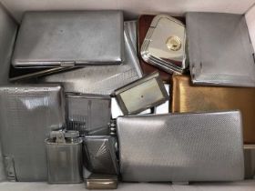 Collection of plated cigarette cases and lighters