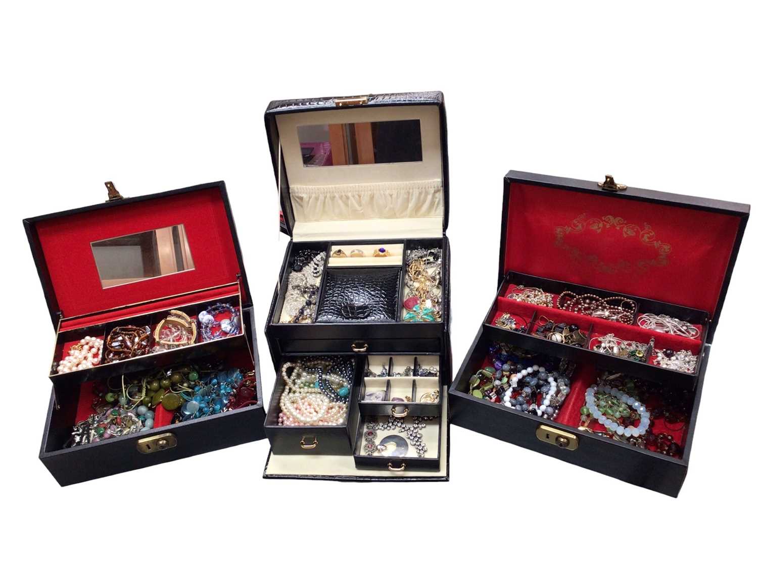 Three jewellery boxes containing costume jewellery including various bead necklaces, pendants, rings