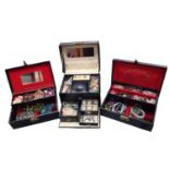 Three jewellery boxes containing costume jewellery including various bead necklaces, pendants, rings