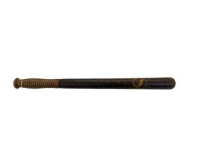 19th century black painted turned wood Police truncheon with gilt lettering 'C S', with ribbed grip,