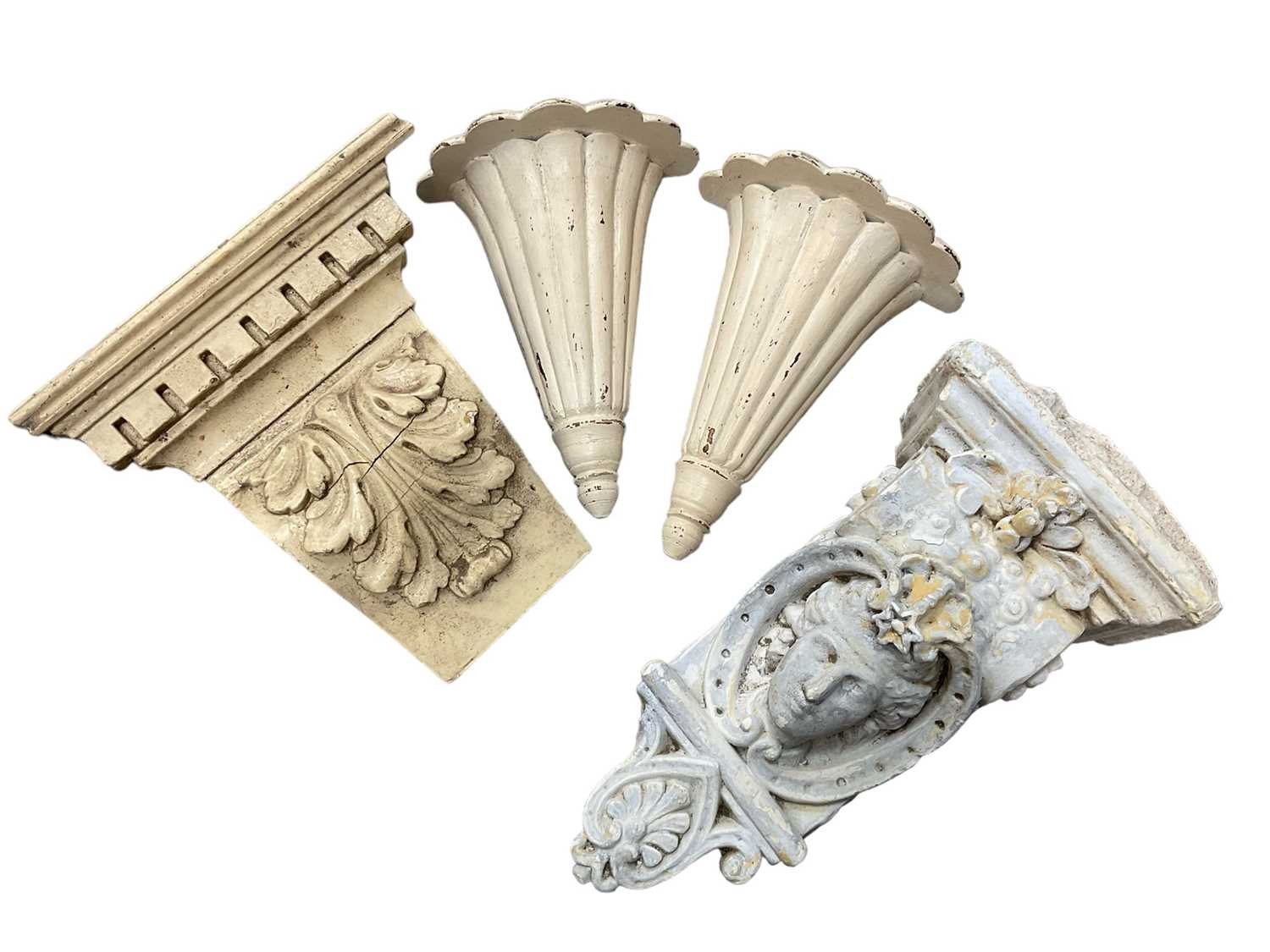 Four decorative corbels / brackets