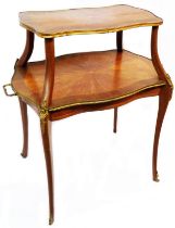 A 66.5cm French mixed wood and brass bound two tier petit four serving table with serpentine