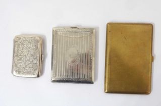 A silver cigarette case with engraved decoration and blank cartouche - sold with a brass and a