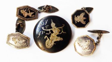 Two pairs of Siam 'sterling' cufflinks and a circular panel brooch, all with typical niello work