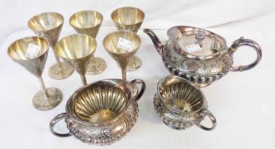 A silver plated three piece tea set of semi reeded design - sold with a set of six silver plated