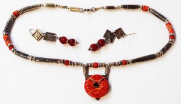 Anne Farag: a designer ethnic style necklace - sold with a pair of marked 'silver' carnelian drop