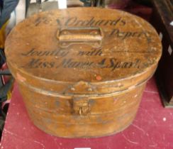 An antique oval hat box with original painted finish and black painted lettering 'Mrs S. Orchards