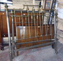 A 1.3m old brass and iron double bedstead with decorative head and footboards and iron side rails