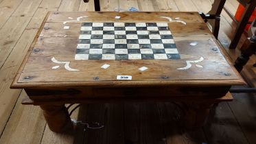 A 60cm Eastern hardwood games table with inlaid top, opposing frieze drawers and iron strap corners,