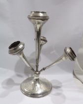 A 22cm high silver epergne with four trumpet vases, set on a loaded circular base with extensive