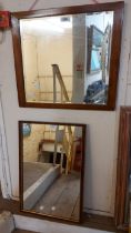 Two oblong wall mirrors, one with decorative painted frame