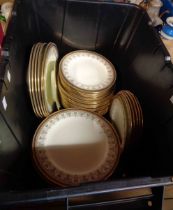 A crate containing a quantity of Cauldon bone china dinner plates of various size