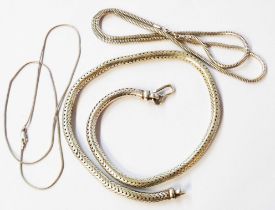 A heavy white metal snake-link necklace - sold with two others - one marked 925