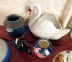 A Dartmouth Pottery swan planter (a/f) - sold with a Poole Pottery dolphin figurine and two