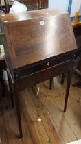 A 61cm 19th Century mahogany and strung bureau with drawer fitted interior, set on an associated