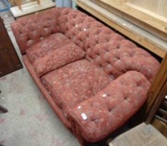 A 1.7m early 20th Century drop-end Chesterfield two seater settee with red button back machine