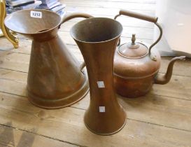 A large copper jug - sold with a copper kettle and similar vase