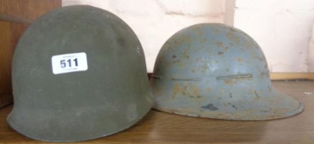 A WWII period Civil Defence helmet of large rimmed form - sold with a later American helmet