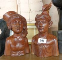 A pair of Indonesian carved hardwood busts