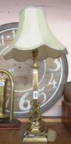 A modern brass table lamp of pillar form - sold with a shade