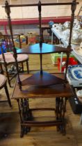A nest of three mahogany tea tables - sold with a small mahogany corner whatnot and a reproduction