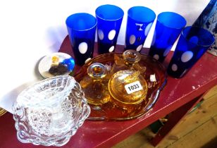 A 1930's amber pressed glass part dressing table set - sold with three other pressed glass items and
