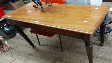 A 1.07m 19th Century mahogany side table with blind frieze drawer, set on faceted and turned tapered