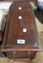 An old Singer sewing machine in original wooden case