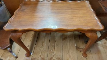 A 60cm 20th Century stained wood tea table with moulded edges
