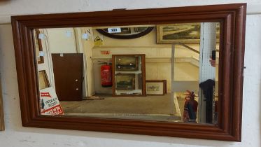 An old mahogany framed bevelled oblong wall mirror - from a dressing table