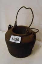 An old cast iron glue pot