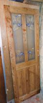 A pine internal door with two glazed panels - 69cm X 1.98m