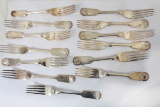 Twelve matching Mappin & Webb silver shell and fiddle pattern dessert forks - comprising nine Sheff