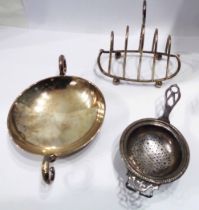 A small silver toast rack with swept ends and hoop dividers - sold with a silver two handled bon bon