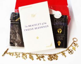 A Compton & Woodhouse 375 (9ct.) gold 'The Bracelet of the Twelve Blessings' with T-bar and loop