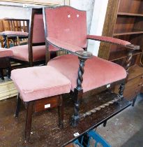 An early 20th Century stained oak framed open armchair with barley twist front supports - sold