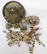 A box containing a quantity of silver plated items including large tray, chambersticks, cutlery,