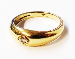 A 375 (9ct.) gold ring, set with small central diamond - size P 1/2